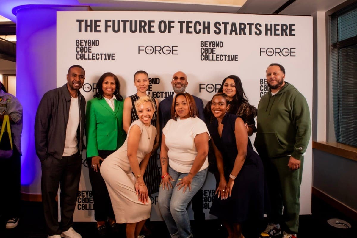 The Forge team group photo at step and repeat