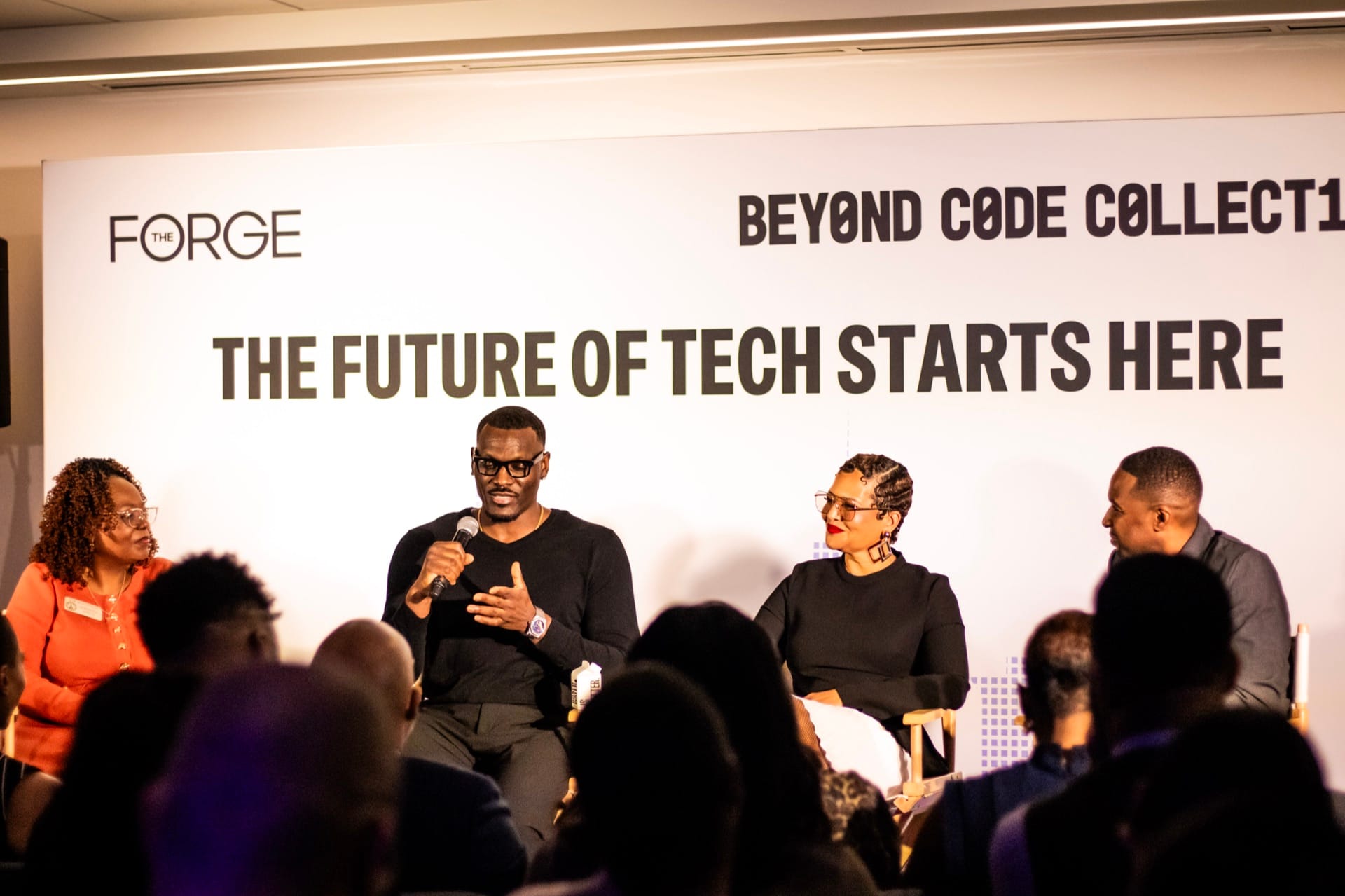 Panelists on stage at The Forge opening event